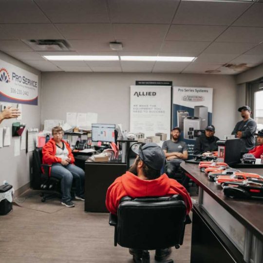 Our team members discussing our HVAC projects in Saskatoon, Canada.